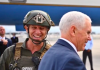 Florida SWAT Officer Demoted After Wearing QAnon Patch In Photo With Mike Pence Swat